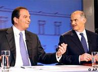 Karamanlis and Papandreou during a television debate in 2004