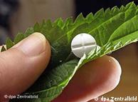 Pill and leaf