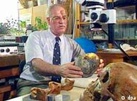 Reiner Protsch von Zieten showing off some of his skulls