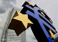 A giant euro symbol in front of the European Central Bank