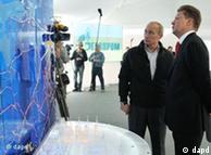 Russian Prime Minister Vladimir Putin, second right, and Gazprom Chief Executive Alexei Miller seen visiting the Portovaya gas compressor station 