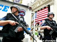 Emergency Service Unit officers patrol the area in front of the New York Stock Exchange