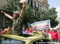 Taxi drivers shout slogans during a demonstration in Athens