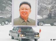 In this image made from KRT television, a huge portrait of late North Korean leader Kim Jong Il is carried in the snow during his funeral procession in Pyongyang, North Korea, Wednesday, Dec. 28, 2011. (AP Photo/KRT via APTN) TV OUT, NORTH KOREA OUT