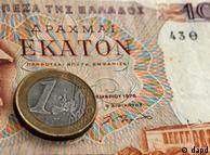 Euro coin and Drachma bill 