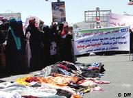 Women in Yemen lined up to burn their headscarves