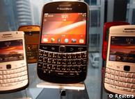 A set of BlackBerry smartphones on display