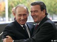 Schroeder hugging Putin