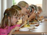 Children eat in a school cantine