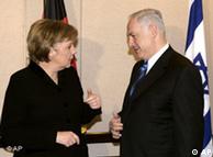 German Chancellor Angela Merkel, left, talking to Israeli Prime Minister Benjamin Netanyahu