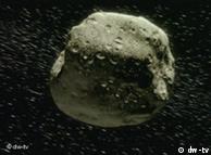 An asteroid pictured against the star-filled vaccuum of space
