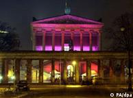 A museum lit up in pink