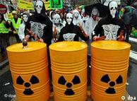 Protest against nuclear energy with toxic waste bins