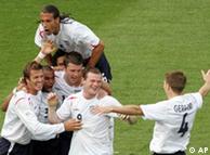 England players congratulate David Beckham on his winner -- as much in relief as celebration