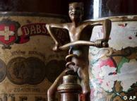Antique corkscrew and old absinthe bottle