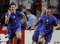 Italy's Fabio Grosso celebrates hitting the first goal