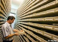 An ICRC employee searches the Bad Arolsen archives