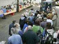 People line up to get food from Die Tafel in Munich
