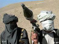 Face-covered militants who they say are Talibans pose with an RPG in Zabul province, southern of Kabul, Afghanistan 