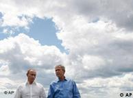 Vladimir Putin and George W. Bush, with fluffy clouds in the background