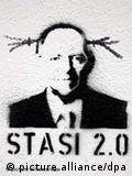 Graffiti showing Stasi 2.0 under a drawing of Schäuble