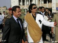 Moammar Gadhafi welcomes French President Nicolas Sarkozy 