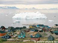 An iceberg in the bay just beyond the town of Ilulissat, Greenland 