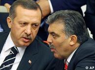 Erdogan, left, speaking with Gül, right