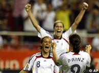 Germany's Birgit Prinz celebrates with Sandra Smisek, left, and Kerstin Garefrekes during the World Cup final
