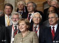Angela Merkel (medio) en el Simposio sobre Sustentabilidad Global. 