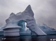 An iceberg melts off Ammassalik Island in Eastern Greenland 