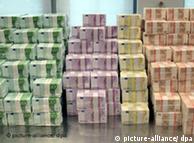 Large piles of euro banknotes