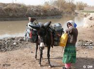 Woman and donkey in Afghanistan