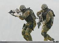 Two German soldiers participate in a training exercise
