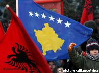 Kosovo Albanians celebrate independence, waving Albanian natioanl flag and Kosovo's flag