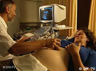 A pregnant woman undergoing ultrasound
