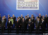 Leaders of the NATO alliance gather for an official photo, at the NATO Summit conference in  Bucharest