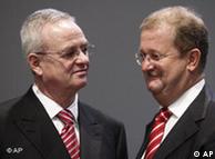 Martin Winterkorn, CEO of Volkswagen, left, and Wendelin Wiedeking, CEO of Porsche