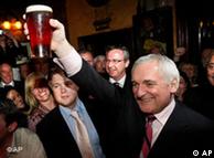 Bertie Ahern enjoys a pint of beer 