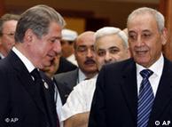 امین جمیل (چپ) و نبیه بری، رئیس پارلمان لبنان در دوحه (قطر) در مه ۲۰۰۸، در اجلاس مذاکره برای تشکیل دولت ائتلاف ملی با شرکت حزب‌الله لبنان