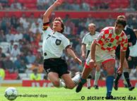 Andreas Moeller is fouled during the Germany-Croatia match at Euro 96