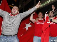 Fans of the Turkish national soccer team celebrate Turkey's 2-1 win over Switzerland 