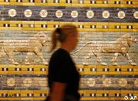 A visitor walks past the Street of Procession which is part of the exhibit Babylon: Myth and Truth at the Pergamon Museum in Berlin