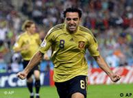 Spain's Xavi Hernandez celebrates after scoring his side's opening goal during the semifinal match between Russia and Spain 