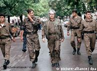 Karadzic with soldiers in Banja Luka in 1995