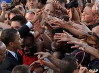 Masses of hands reaching out to Obama