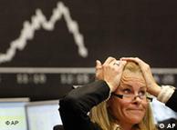 A broker reacts at the stock exchange in Frankfurt, central Germany