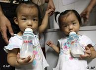 Children drinking from Sanlu brand bottles while waiting to be checked for kidney stones at a children's hospital in Shenzhen, in south China's Guangdong province Wednesday.