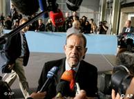 EU foreign policy chief Javier Solana, center, speaks with the media 