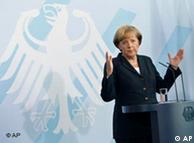 Merkel at a press conference